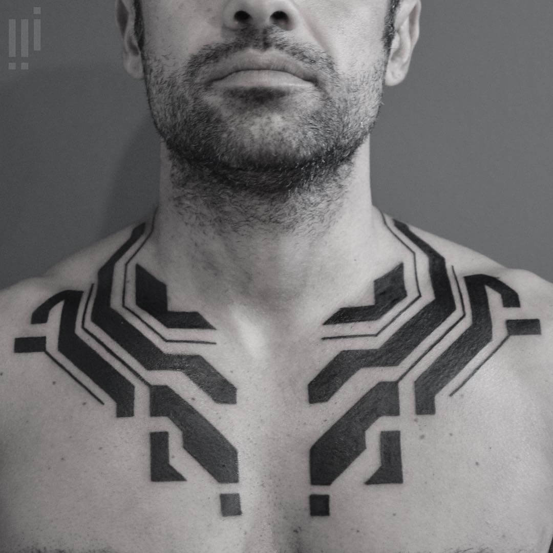 Artist takes inspiration from circuit boards to create futuristic tribal tattoos